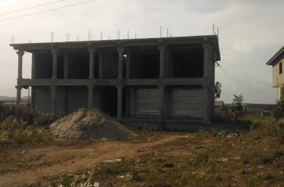 Four plots of Land by the main road for Sale at Kasoa Jei River